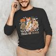 Trick Or Teach Groovy Teacher Halloween Floral Ghost Men's Long Sleeve T-Shirt, novelty gifts, funny gifts
