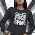 First Grade Coquette Bow Girls Teacher Team 1st Grade Squad Women Long Sleeve T-Shirt, First Grade Teacher Shirts, funny gift