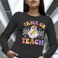 Trick Or Teach Groovy Halloween Teachers Women Long Sleeve T-Shirt, funny gift