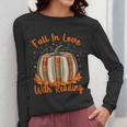 Fall In Love With Reading Pumpkin Autumn Librarians Teacher Women Long Sleeve T-Shirt, funny design