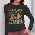 Groovy Fall In Love With Learning Autumn Pumpkin Teacher Women Long Sleeve T-Shirt, Groovy Teacher Gifts, funny design
