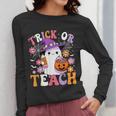 Trick Or Teach Groovy Teacher Ghost Halloween Teacher Women Long Sleeve T-Shirt, Groovy Teacher Gifts, funny design Trick Or Teach Groovy Teacher Ghost Halloween Teacher Women Long Sleeve T-Shirt, Groovy Teacher Gifts, funny design