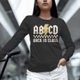 Boys Girls Teachers Rock Back To School ABCD Back In Class Women Long Sleeve T-Shirt, gift for family, gift for coworker