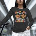 Fall In Love With Learning Autumn Fall Season Teacher Women Long Sleeve T-Shirt, gift for family, gift for coworker