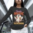 Groovy Faboolous Spooky Music Teacher Halloween Men Women Women Long Sleeve T-Shirt, Groovy Teacher Shirts, gift for family, gift for coworker