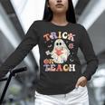Groovy Halloween Trick Or Teach Retro Floral Ghost Teacher Women Long Sleeve T-Shirt, Groovy Teacher Shirts, gift for family, gift for coworker Groovy Halloween Trick Or Teach Retro Floral Ghost Teacher Women Long Sleeve T-Shirt, Groovy Teacher Shirts, gift for family, gift for coworker