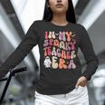 Groovy In My Spooky Teacher Era Halloween Party Boo Women Long Sleeve T-Shirt, Groovy Teacher Shirts, gift for family, gift for coworker Groovy In My Spooky Teacher Era Halloween Party Boo Women Long Sleeve T-Shirt, Groovy Teacher Shirts, gift for family, gift for coworker