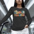 Groovy Toddler Teacher Appreciation Back To School Women Long Sleeve T-Shirt, Groovy Teacher Shirts, gift for family, gift for coworker Groovy Toddler Teacher Appreciation Back To School Women Long Sleeve T-Shirt, Groovy Teacher Shirts, gift for family, gift for coworker