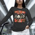 Inclusion Isn't Scary SLP Sped Teacher Halloween Women Long Sleeve T-Shirt, gift for family, gift for coworker Inclusion Isn't Scary SLP Sped Teacher Halloween Women Long Sleeve T-Shirt, gift for family, gift for coworker