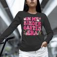 In My Kindergarten Era Girl Back To School Kinder Teacher Women Long Sleeve T-Shirt, gift for family, gift for coworker In My Kindergarten Era Girl Back To School Kinder Teacher Women Long Sleeve T-Shirt, gift for family, gift for coworker