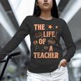 The Life Of A Teacher Back To School Women Men Women Long Sleeve T-Shirt, gift for family, gift for coworker