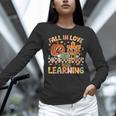 Retro Fall In Love With Learning Autumn Pumpkin Teacher Kids Women Long Sleeve T-Shirt, gift for family, gift for coworker