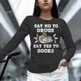 Teachers Red Ribbon Week Say No To Drugs Say Yes To Books Women Long Sleeve T-Shirt, gift for family, gift for coworker Teachers Red Ribbon Week Say No To Drugs Say Yes To Books Women Long Sleeve T-Shirt, gift for family, gift for coworker