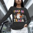 Trick Or Teach Ghost Teacher School Halloween Men Women Women Long Sleeve T-Shirt, gift for family, gift for coworker Trick Or Teach Ghost Teacher School Halloween Men Women Women Long Sleeve T-Shirt, gift for family, gift for coworker