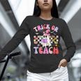 Trick Or Teach Halloween Teacher Floral Ghost Groovy Women Long Sleeve T-Shirt, Groovy Teacher Shirts, gift for family, gift for coworker Trick Or Teach Halloween Teacher Floral Ghost Groovy Women Long Sleeve T-Shirt, Groovy Teacher Shirts, gift for family, gift for coworker