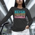 Never Underestimate A Public School Teacher Groovy Women Women Long Sleeve T-Shirt, Groovy Teacher Shirts, gift for family, gift for coworker