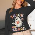 Groovy Halloween Trick Or Teach Retro Floral Ghost Teacher Women Long Sleeve T-Shirt, novelty gifts, funny gifts Groovy Halloween Trick Or Teach Retro Floral Ghost Teacher Women Long Sleeve T-Shirt, novelty gifts, funny gifts