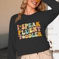 Groovy I Speak Fluent Toddler Daycare Provider Teacher Women Long Sleeve T-Shirt, novelty gifts, funny gifts Groovy I Speak Fluent Toddler Daycare Provider Teacher Women Long Sleeve T-Shirt, novelty gifts, funny gifts