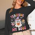 Groovy Teaching My Boos Teacher Ghost Halloween Teacher Women Long Sleeve T-Shirt, novelty gifts, funny gifts Groovy Teaching My Boos Teacher Ghost Halloween Teacher Women Long Sleeve T-Shirt, novelty gifts, funny gifts