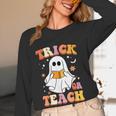 Retro Vintage Groovy Trick Or Teach Teacher Halloween For Men Women Kids Women Long Sleeve T-Shirt, novelty gifts, funny gifts