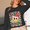 Santas Favorite Teacher Retro Groovy Smile Face Christmas Women Long Sleeve T-Shirt, novelty gifts, funny gifts Santas Favorite Teacher Retro Groovy Smile Face Christmas Women Long Sleeve T-Shirt, novelty gifts, funny gifts