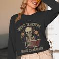 Weird Teachers Build Character Skeleton Book Halloween Women Women Long Sleeve T-Shirt, novelty gifts, funny gifts Weird Teachers Build Character Skeleton Book Halloween Women Women Long Sleeve T-Shirt, novelty gifts, funny gifts