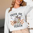 Trick Or Teach Teacher Women Long Sleeve T-Shirt, novelty gifts, funny gifts Trick Or Teach Teacher Women Long Sleeve T-Shirt, novelty gifts, funny gifts