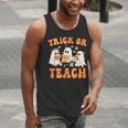 Teacher Halloween Trick Or Teach Retro Groovy Floral Ghost Men Tank Top, Groovy Teacher Tank Tops, funny gift Teacher Halloween Trick Or Teach Retro Groovy Floral Ghost Men Tank Top, Groovy Teacher Tank Tops, funny gift
