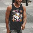 Trick Or Teach Groovy Teacher Halloween Retro Ghost Men Tank Top, Groovy Teacher Tank Tops, funny gift Trick Or Teach Groovy Teacher Halloween Retro Ghost Men Tank Top, Groovy Teacher Tank Tops, funny gift