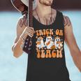 Groovy Teacher Halloween Trick Or Teach Ghost Men Women Kids Men Tank Top, Groovy Teacher Tank Tops, gift for family, gift for coworker Groovy Teacher Halloween Trick Or Teach Ghost Men Women Kids Men Tank Top, Groovy Teacher Tank Tops, gift for family, gift for coworker