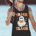 Retro Vintage Groovy Trick Or Teach Teacher Halloween For Men Women Kids Men Tank Top, Groovy Teacher Tank Tops, gift for family, gift for coworker Retro Vintage Groovy Trick Or Teach Teacher Halloween For Men Women Kids Men Tank Top, Groovy Teacher Tank Tops, gift for family, gift for coworker