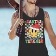 Santas Favorite Teacher Retro Groovy Smile Face Christmas Men Tank Top, Groovy Teacher Tank Tops, gift for family, gift for coworker Santas Favorite Teacher Retro Groovy Smile Face Christmas Men Tank Top, Groovy Teacher Tank Tops, gift for family, gift for coworker