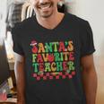 Santas Favorite Teacher Retro Groovy Christmas Xmas Women Men's V-Neck T-Shirt, Groovy Teacher Shirts, funny gift Santas Favorite Teacher Retro Groovy Christmas Xmas Women Men's V-Neck T-Shirt, Groovy Teacher Shirts, funny gift
