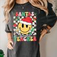 Santas Favorite Teacher Retro Groovy Smile Face Christmas Women's Comfort Colors T-Shirt Pepper Santas Favorite Teacher Retro Groovy Smile Face Christmas Women's Comfort Colors T-Shirt Pepper