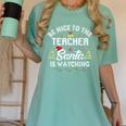 Christmas Be Nice To The Teacher Santa Is Watching Xmas Women's Comfort Colors T-Shirt Chalky Mint Christmas Be Nice To The Teacher Santa Is Watching Xmas Women's Comfort Colors T-Shirt Chalky Mint