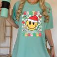 Santas Favorite Teacher Retro Groovy Smile Face Christmas Women's Comfort Colors T-Shirt Chalky Mint Santas Favorite Teacher Retro Groovy Smile Face Christmas Women's Comfort Colors T-Shirt Chalky Mint