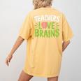 Teachers Love Brains Halloween Teacher Zombie Women's Comfort Colors T-Shirt Back Print Mustard Teachers Love Brains Halloween Teacher Zombie Women's Comfort Colors T-Shirt Back Print Mustard