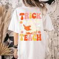 Trick Or Teach Halloween Shirt For Teacher Kids Floral Ghost Women's Comfort Colors T-Shirt Back Print Ivory