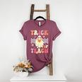 Groovy Teacher Halloween Retro Trick Or Teach Floral Ghost Women's Heather T-Shirt Heather Maroon Groovy Teacher Halloween Retro Trick Or Teach Floral Ghost Women's Heather T-Shirt Heather Maroon