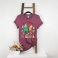 One Merry Teacher Groovy Christmas Tree Pjs Xmas Teacher Women's Heather T-Shirt Heather Maroon