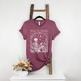 Read In Peace Skeleton Reading Teacher Spooky Halloween Women's Heather T-Shirt Heather Maroon