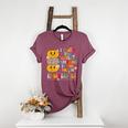 I Teach The Cutest Pumpkins Kindergarten Teacher Halloween Women's Heather T-Shirt Heather Maroon