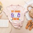 1st Grade Boo Crew First Grade Teacher Kids Happy Halloween Women's Heather T-Shirt Heather Peach