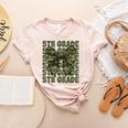 5th Grade Teacher Student Camo Bow Back To School Women's Heather T-Shirt Heather Peach