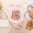 ABCs Learning Kindergarten Teacher Halloween Alphabet Women's Heather T-Shirt Heather Peach ABCs Learning Kindergarten Teacher Halloween Alphabet Women's Heather T-Shirt Heather Peach