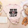 Boo Boo Crew First Aid School Nurse Day Care Teacher Women's Heather T-Shirt Heather Peach