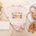 All Is Calm Xmas Kindergarten Christmas Season Teacher Women's Heather T-Shirt Heather Peach All Is Calm Xmas Kindergarten Christmas Season Teacher Women's Heather T-Shirt Heather Peach