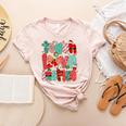 Christmas Coquette Bow Teacher Teach Love Inspire Women's Heather T-Shirt Heather Peach Christmas Coquette Bow Teacher Teach Love Inspire Women's Heather T-Shirt Heather Peach