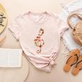 Christmas Musical Note Music Lover Teacher Sing Carols Jesus Women's Heather T-Shirt Heather Peach