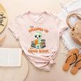 Cute Halloween Teacher Librarian Mummy Reading Books Women's Heather T-Shirt Heather Peach